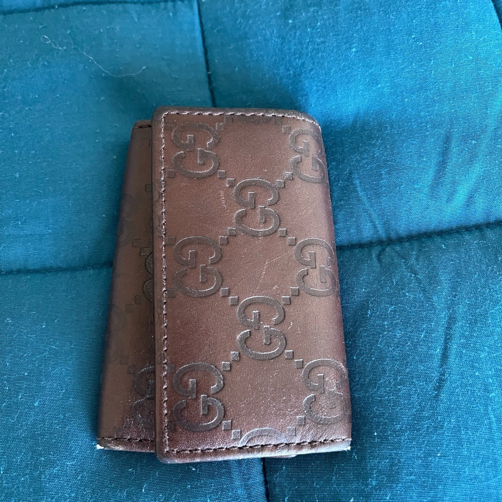Gucci key holder.